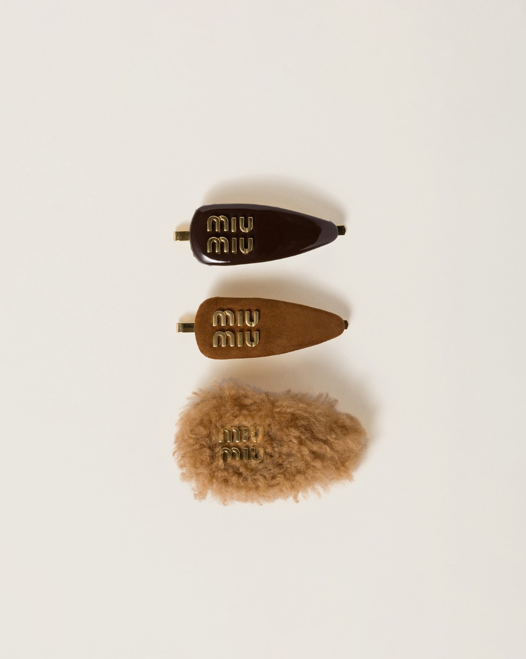 Image 87: Set of leather, suede, and shearling hair clips