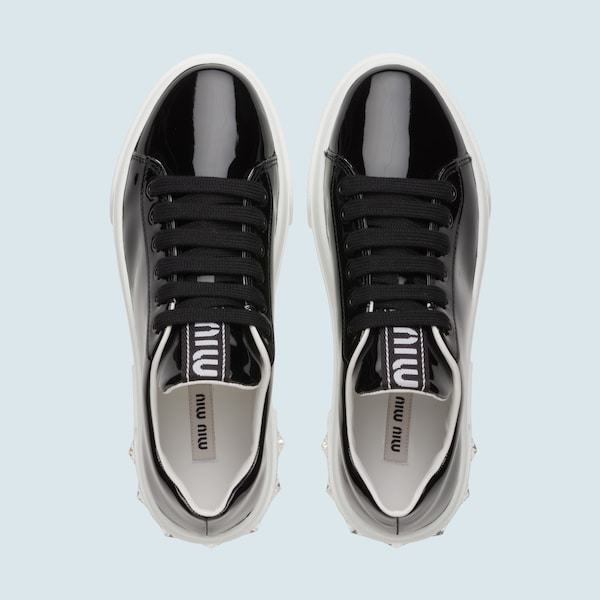 black patent leather sneakers
