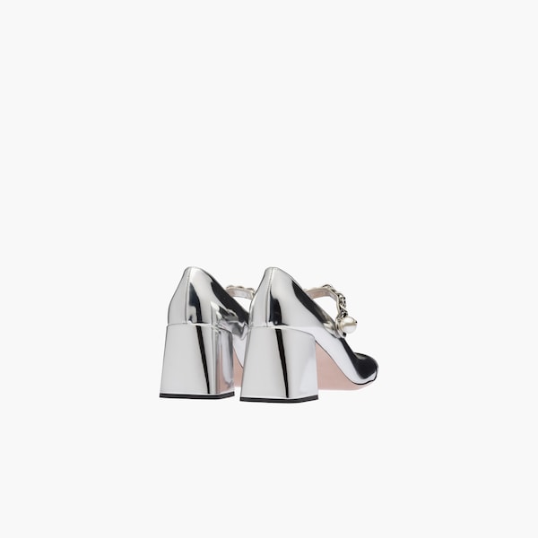 silver metallic pumps