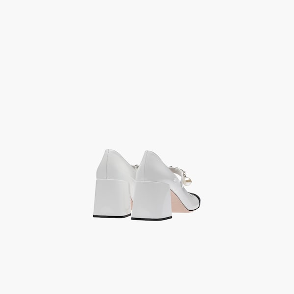 white patent pumps