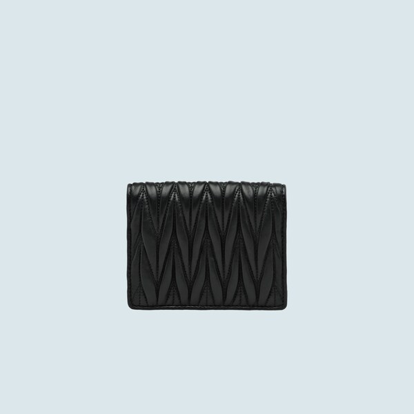 chain wallet in pink and white textured matelassé leather