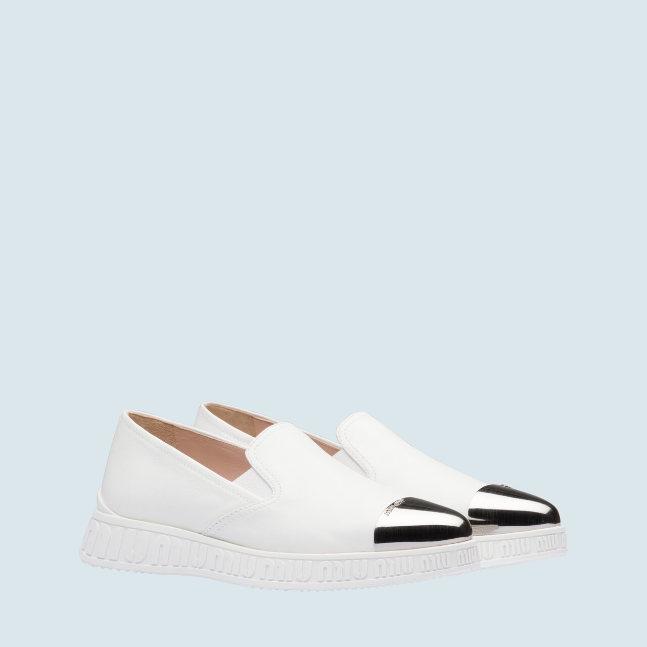 white leather slip ons
