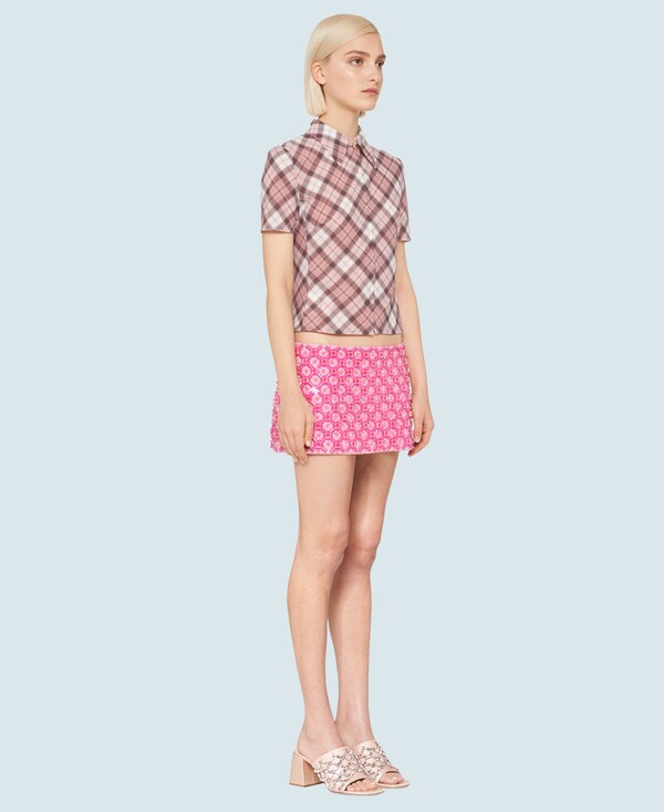 MIUMIU】キャディのミニスカート