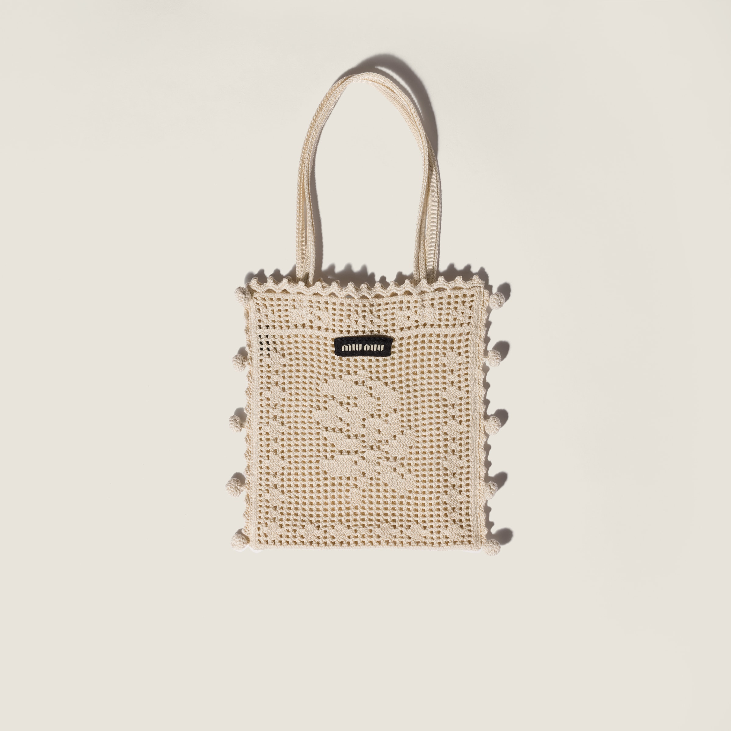 Cotton crochet handbag from Miu Miu - $1,470