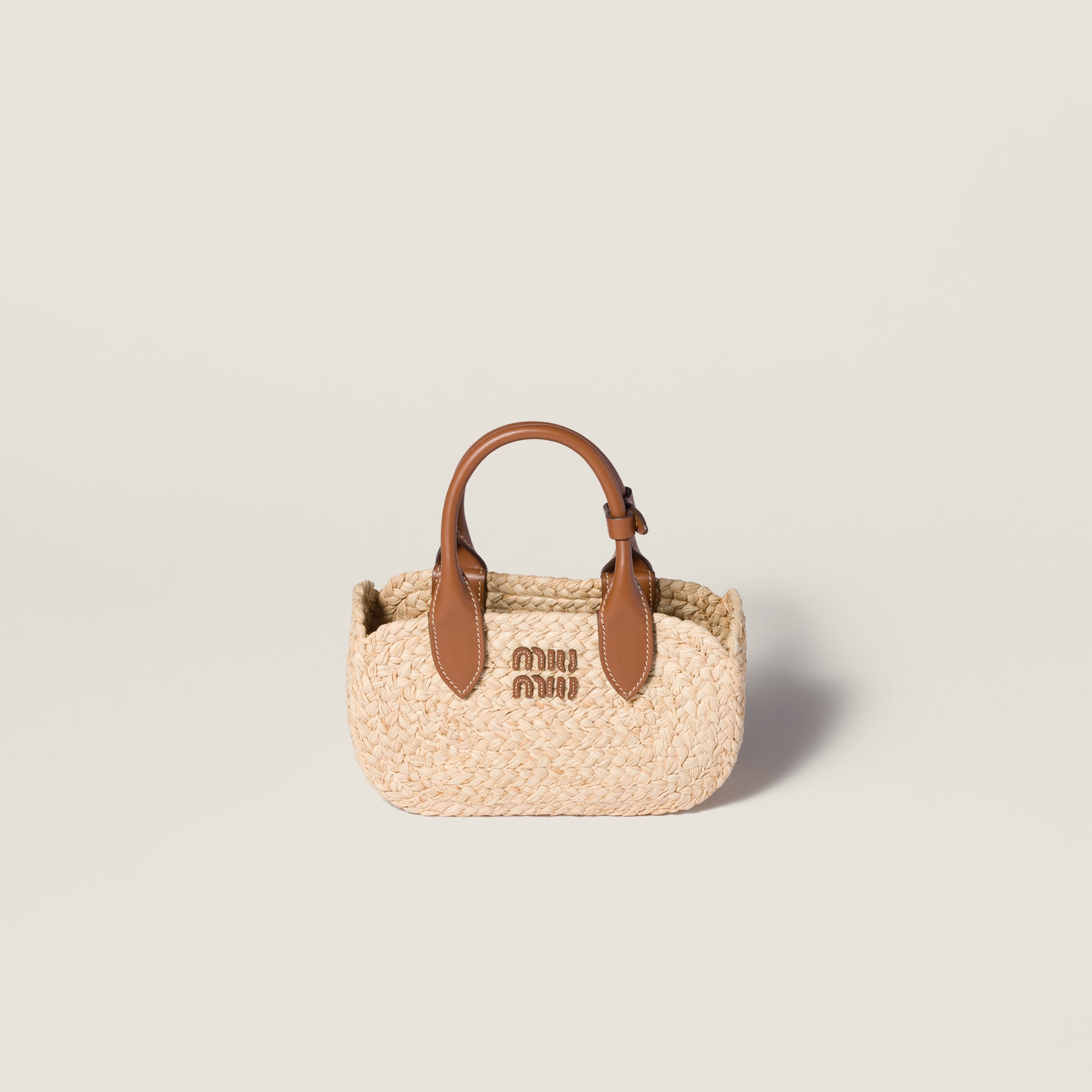 Raffia handbag from Miu Miu - $1,270