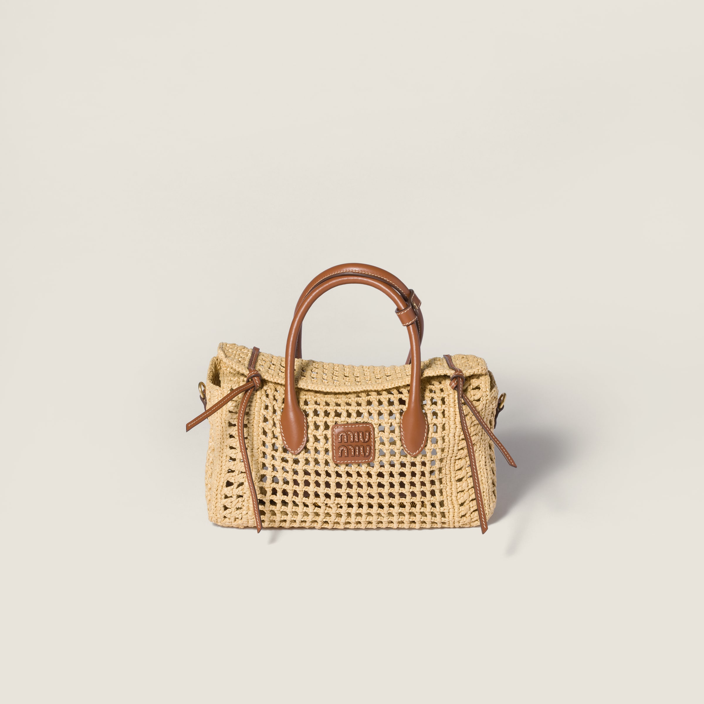 Raffia handbag from Miu Miu - $2,800