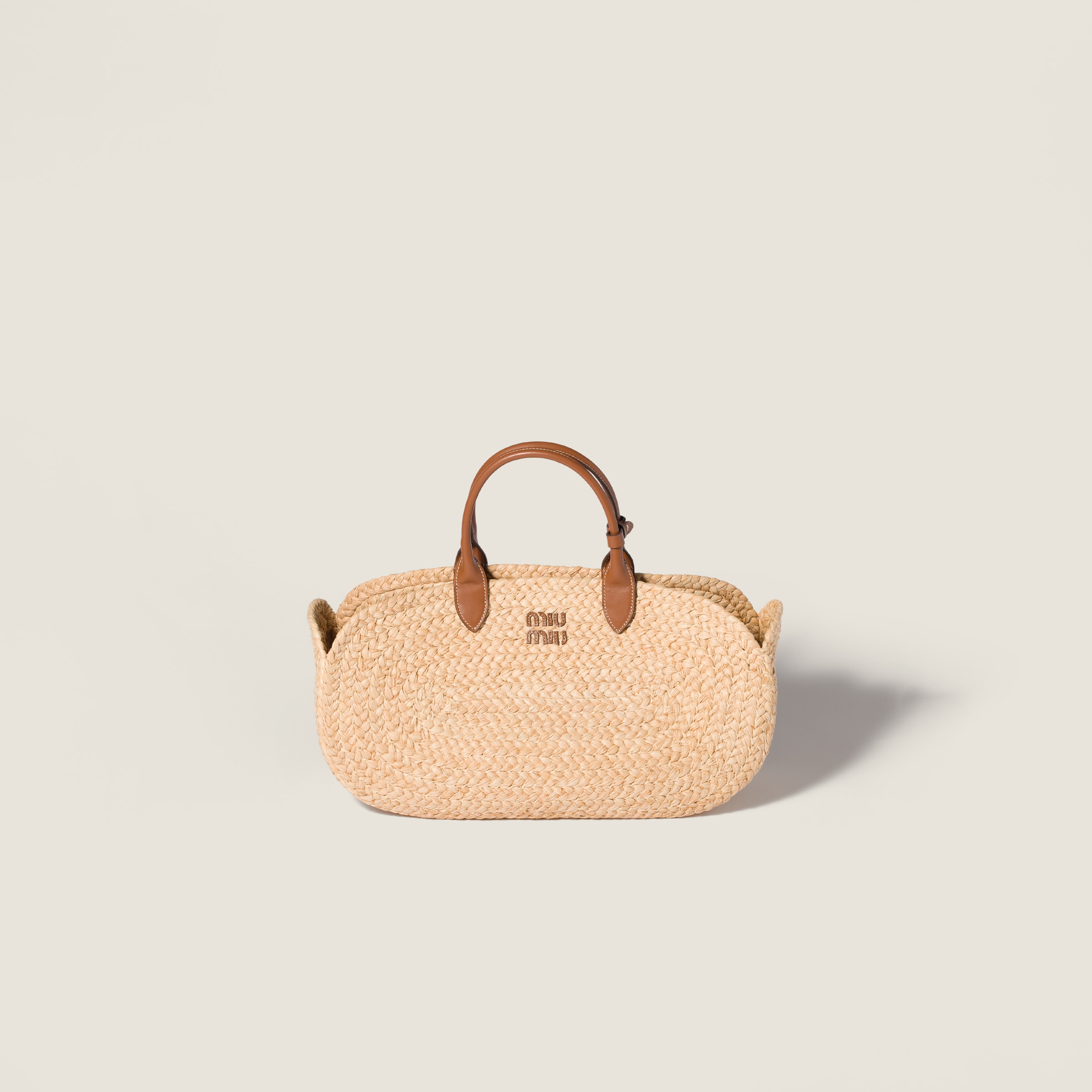 Raffia handbag from Miu Miu - $1,890