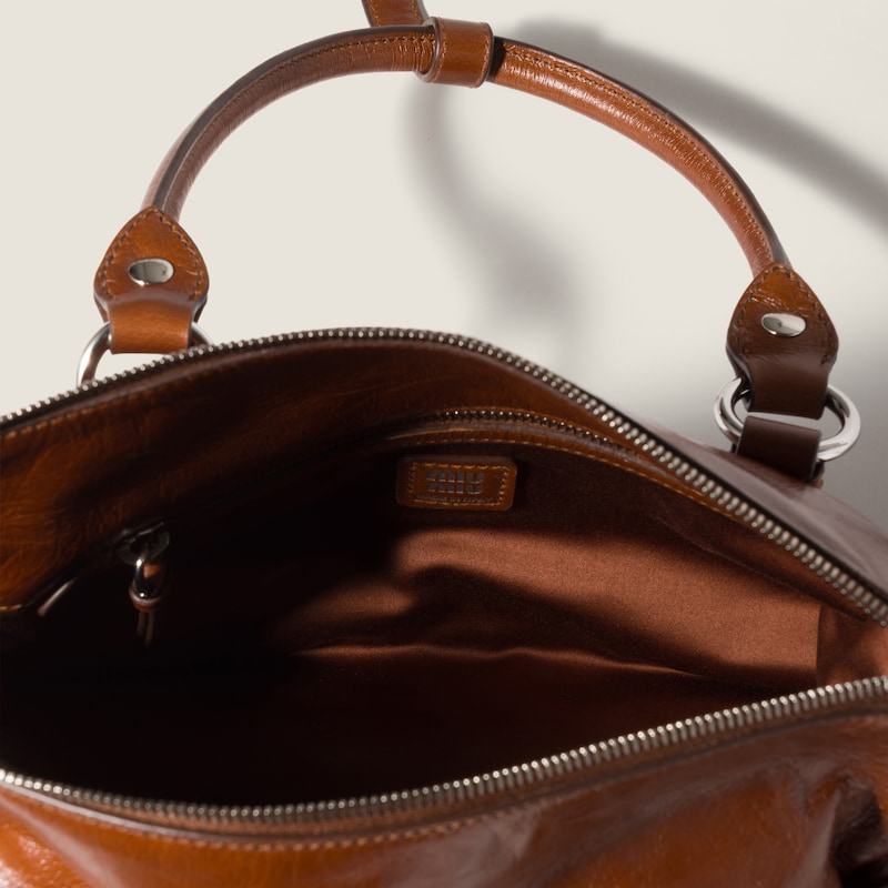 Shiny leather handbag