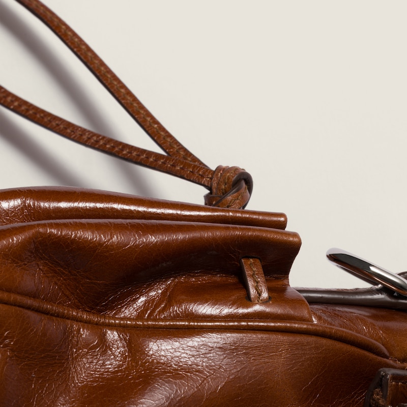 Glossy leather handbag