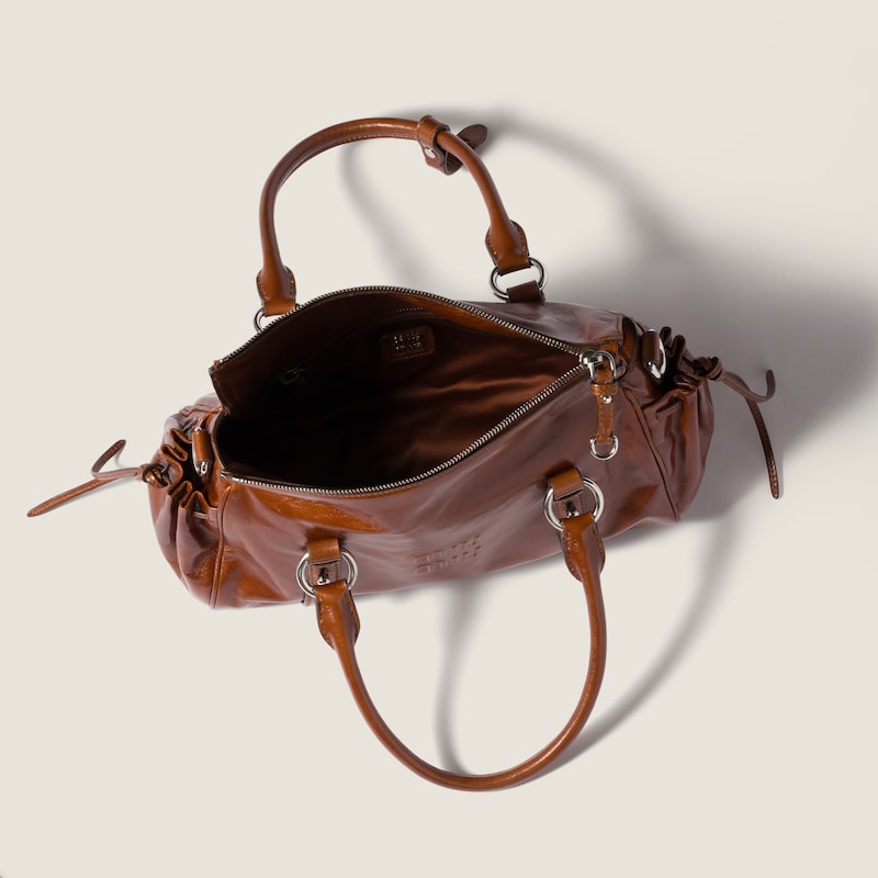 Glossy leather handbag