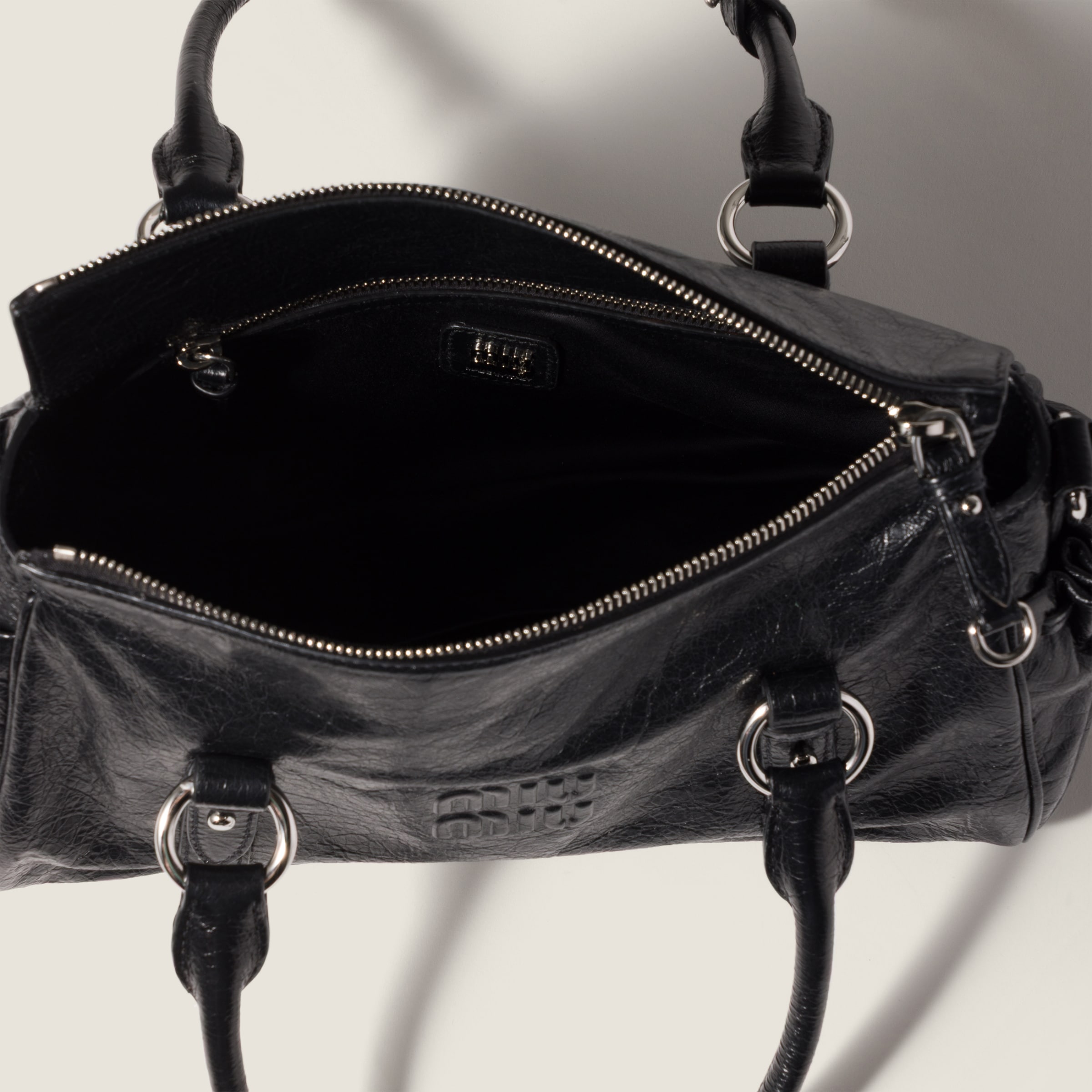 ブラック ナッパレザー ハンドバッグ | Miu Miu