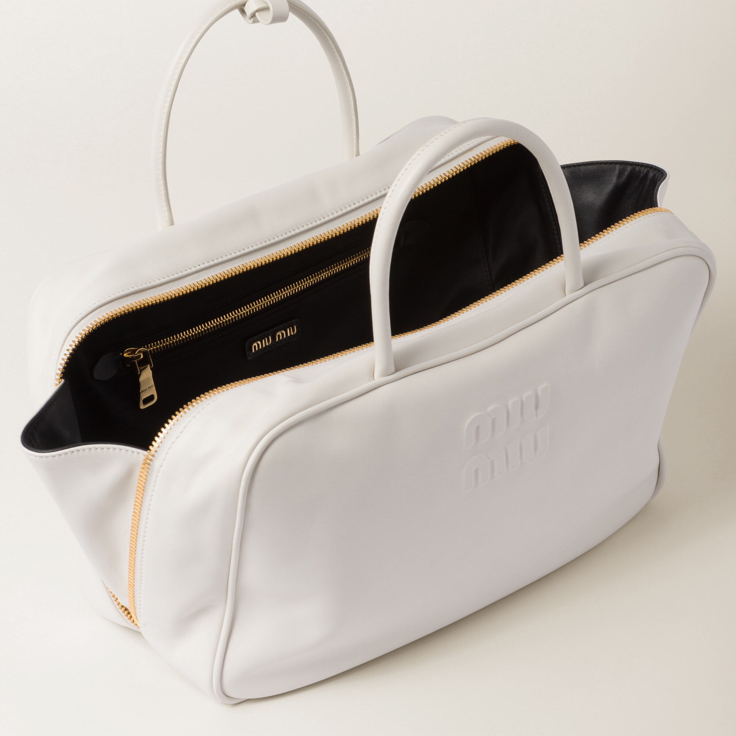 White miu miu bag best sale