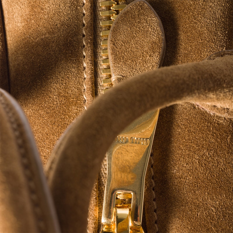 Arcadie padded suede top-handle bag