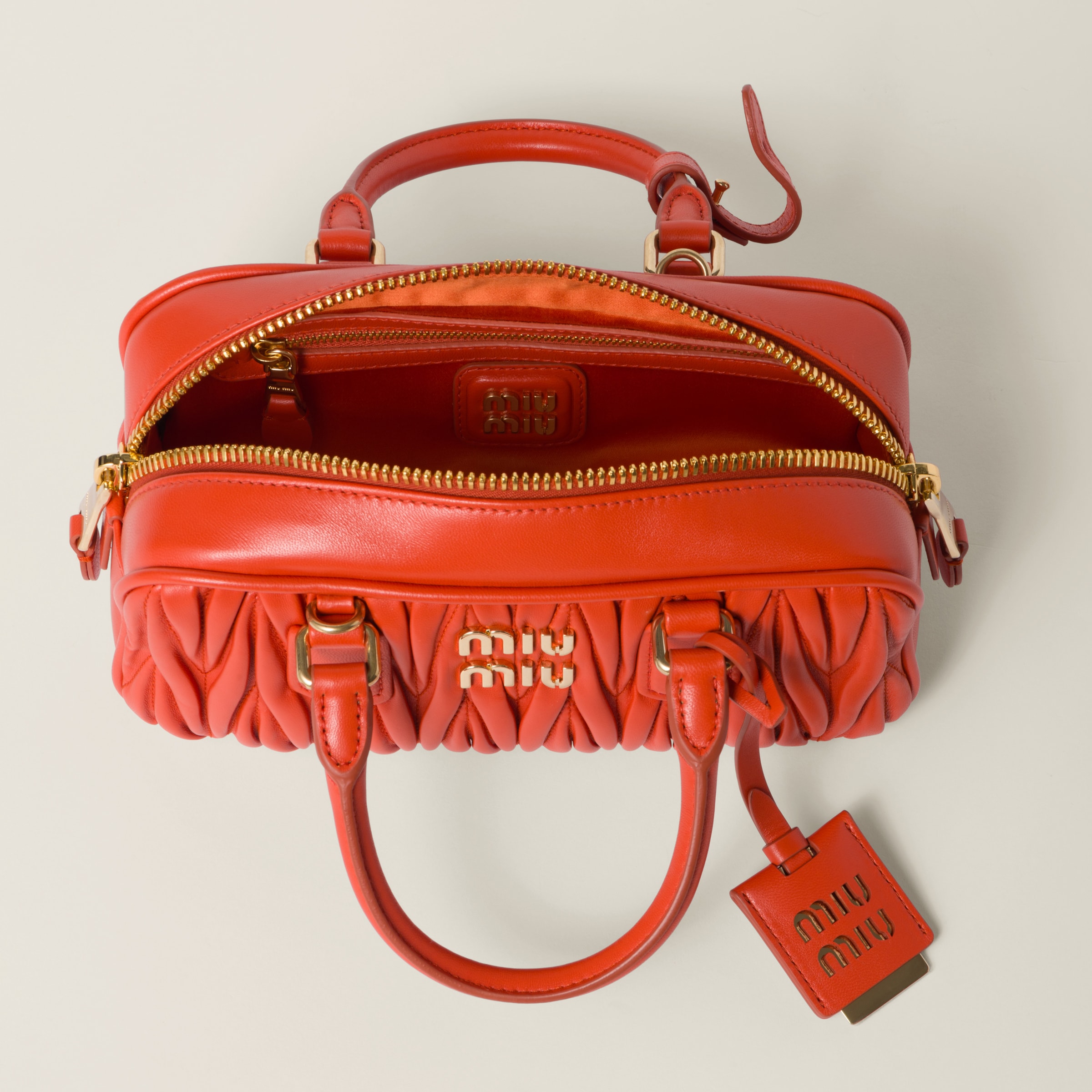 Shop Miumiu Arcadie Matelassé Nappa Leather Bag In Orange