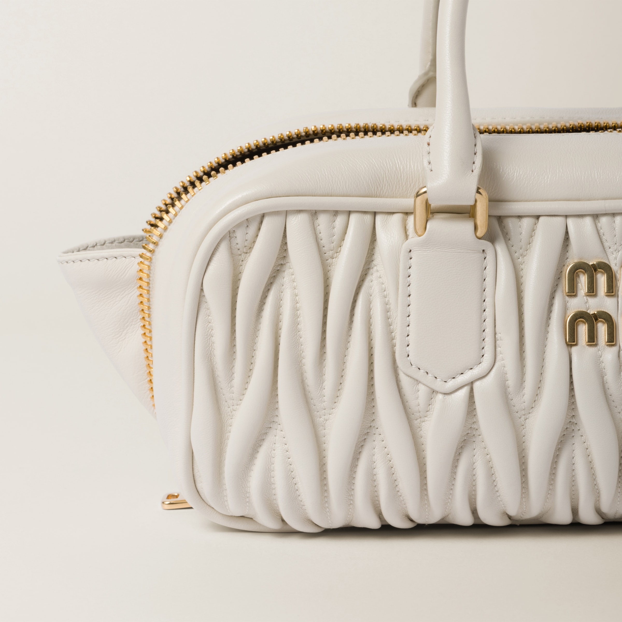 White miu miu bag top
