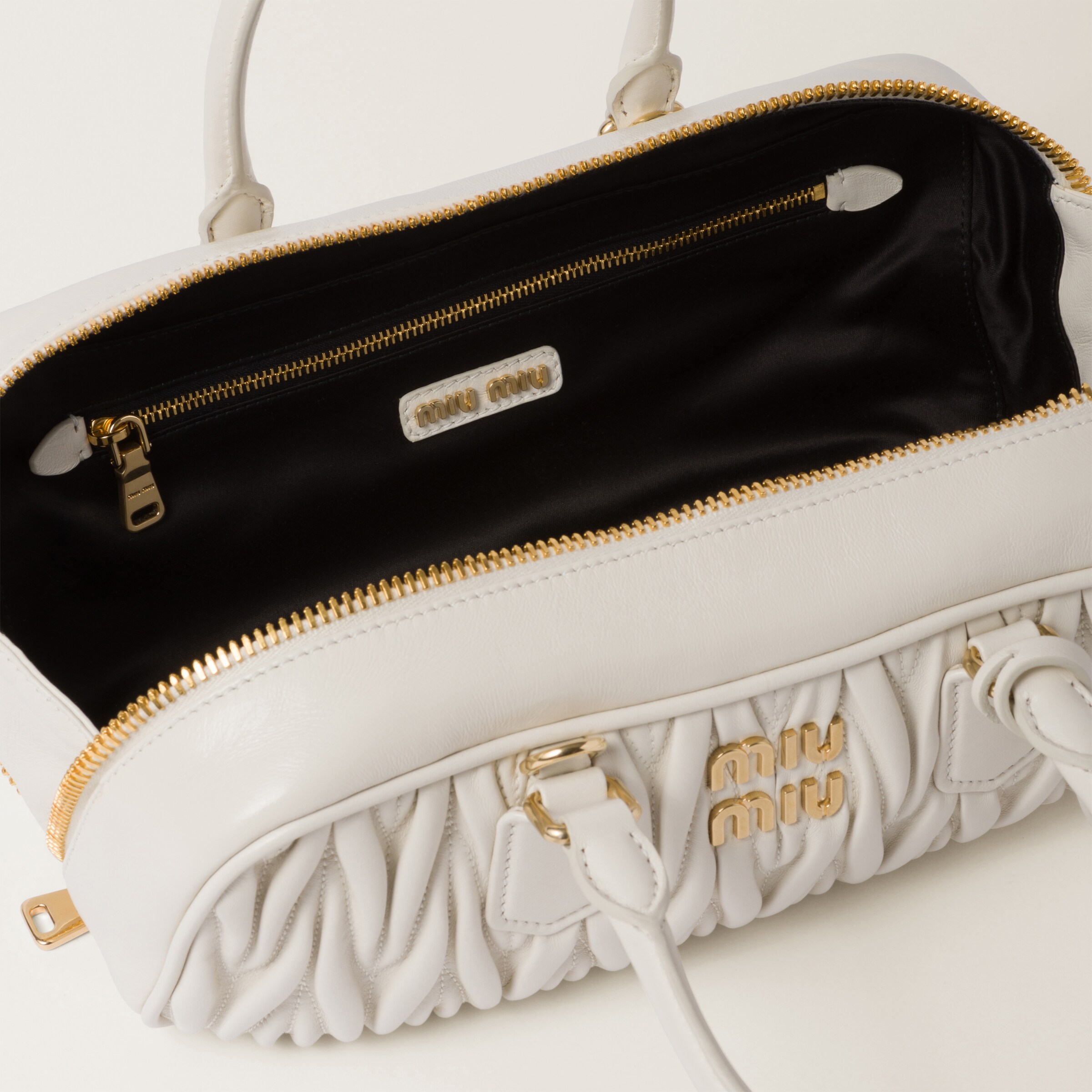 White miu miu bag store