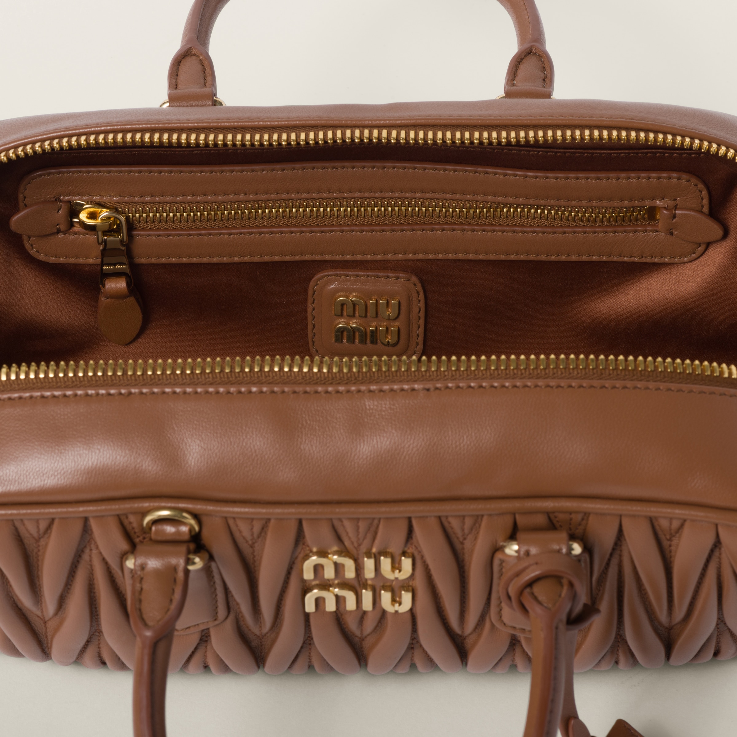 Shop Miumiu Arcadie Matelassé Nappa Leather Bag In Cognac