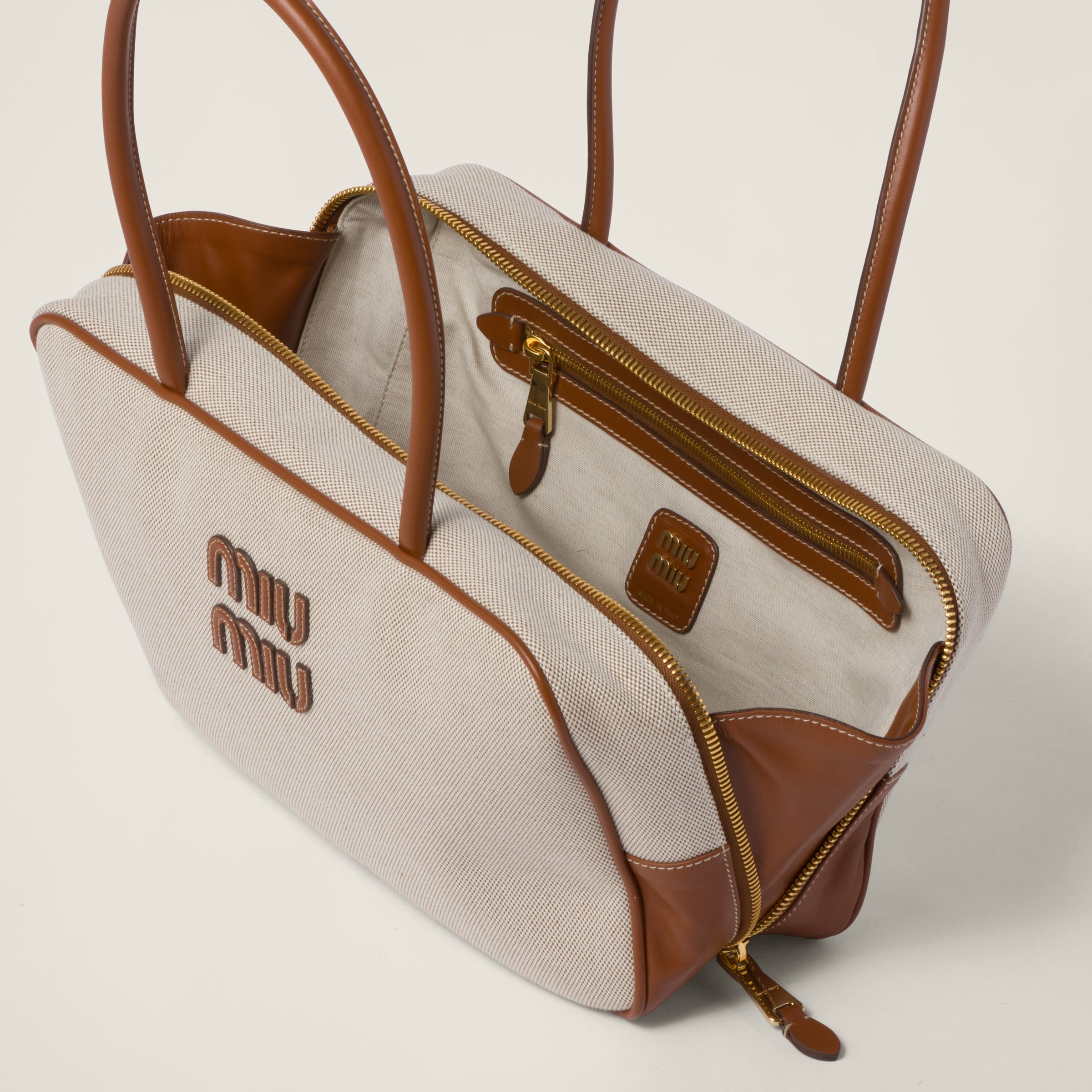 Beige brandy Canvas Top handle Bag Miu Miu