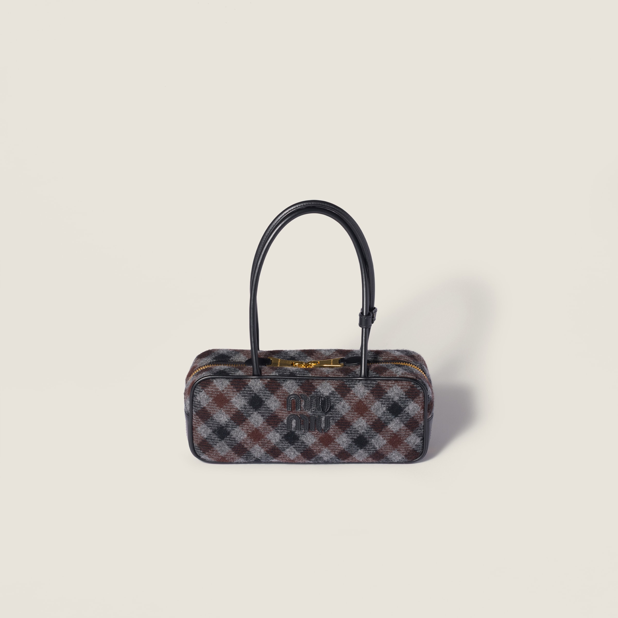Beau plaid and leather bag