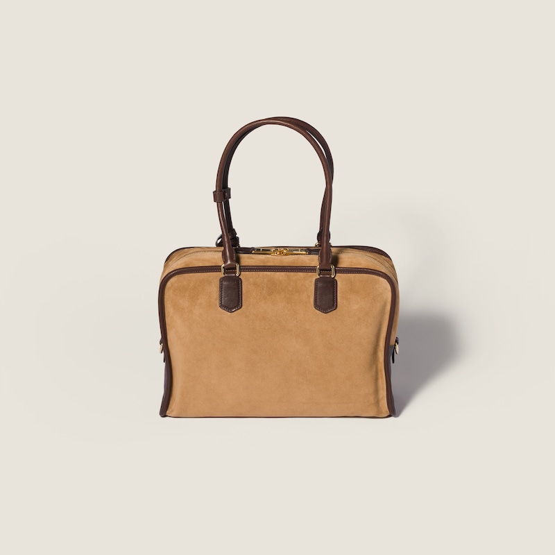 Retour Tasche aus Veloursleder