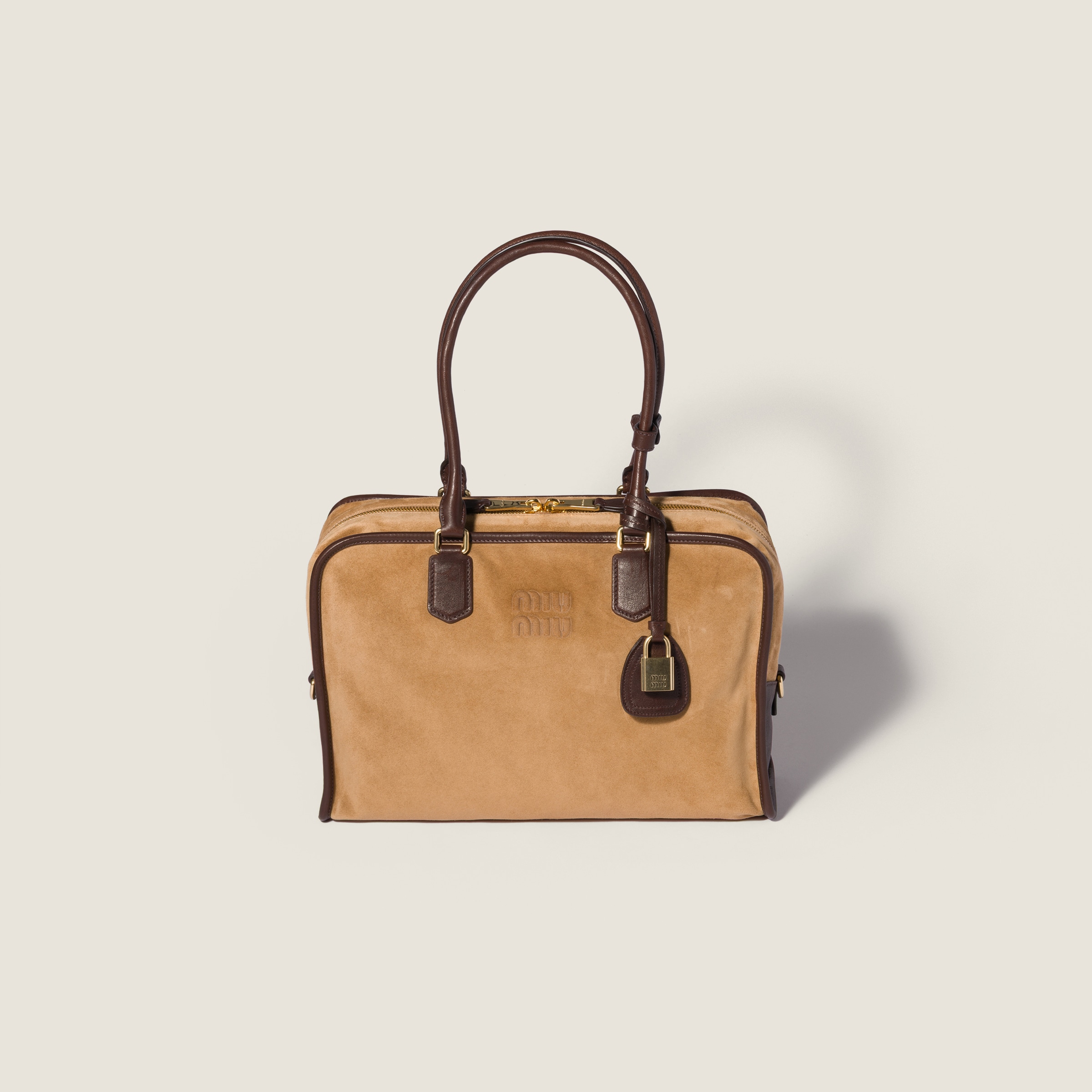 Retour suede bag by Miu Miu