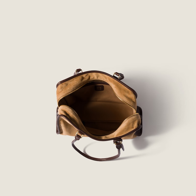 Retour Tasche aus Veloursleder