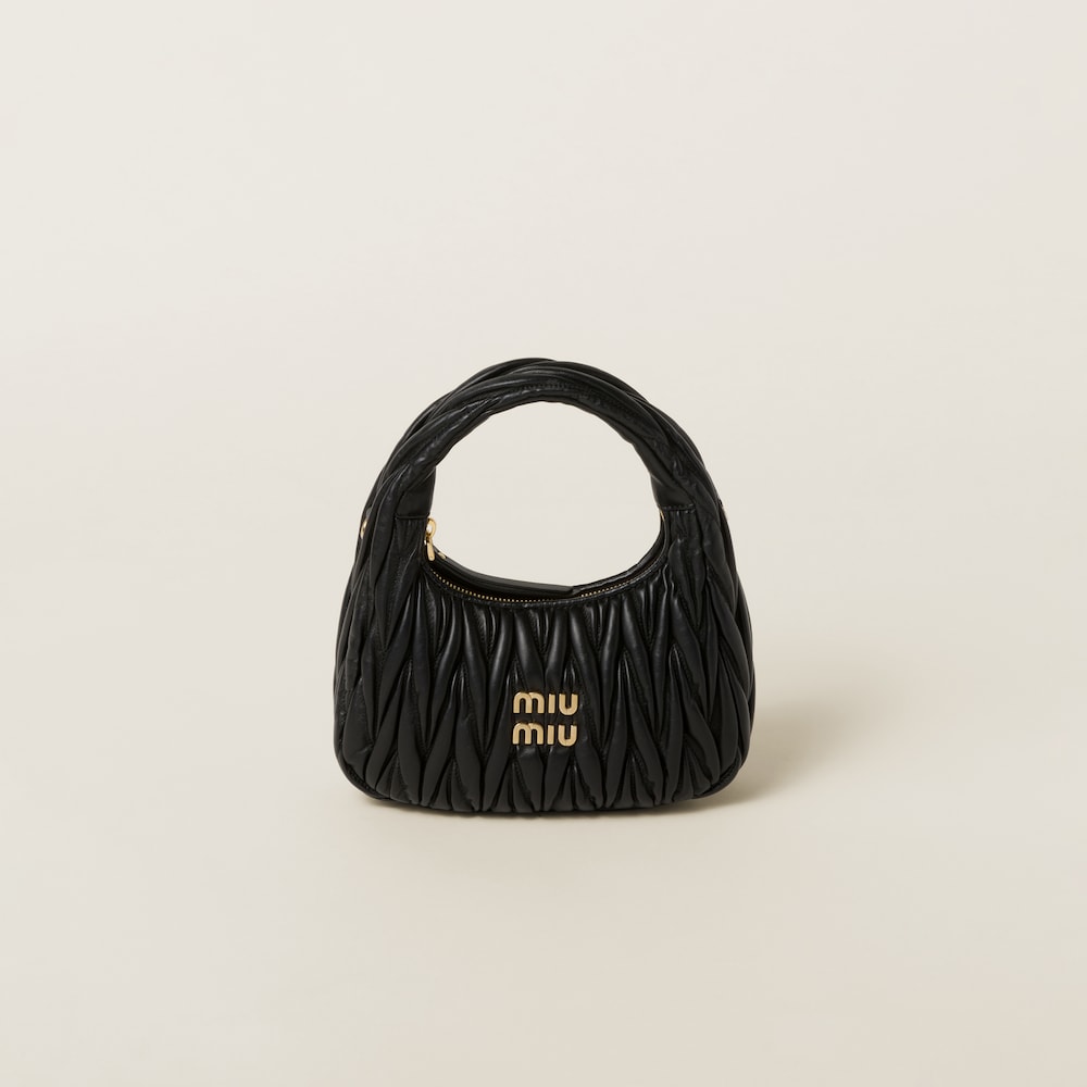 Wander matelassé nappa leather mini hobo bag by Miu Miu, available on miumiu.com for $2750 Emily Ratajkowski Bags Exact Product 