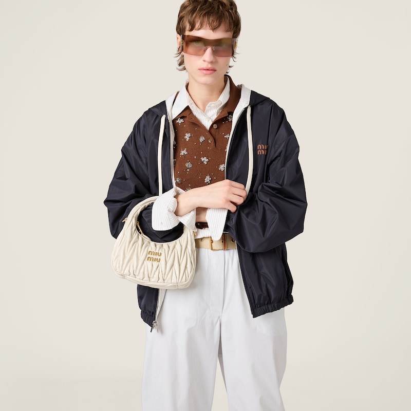 Wander matelassé patent leather bag