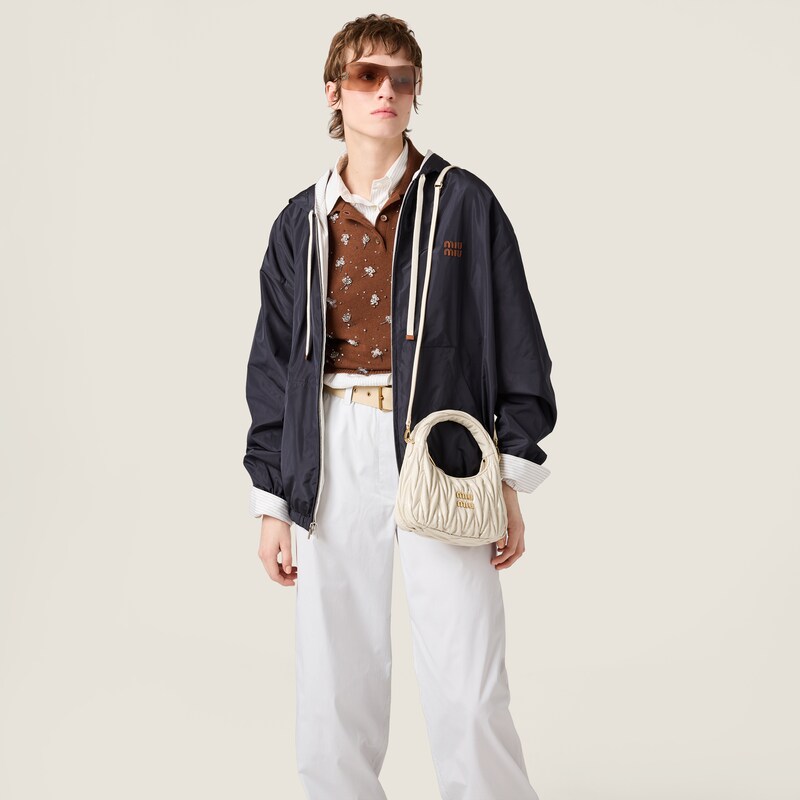 Wander matelassé patent leather bag