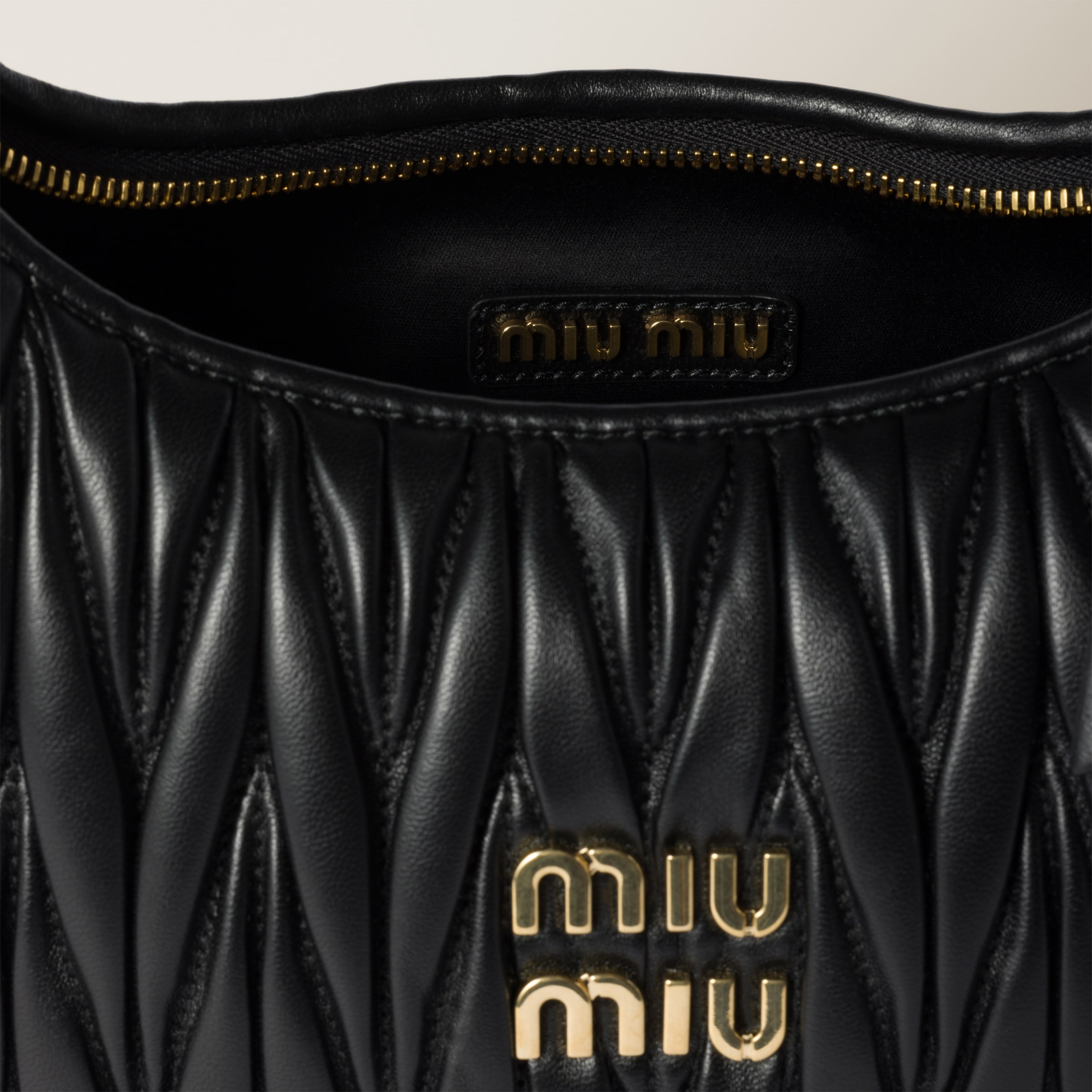 Black Wander Matelassé Nappa Leather Hobo Bag | Miu Miu