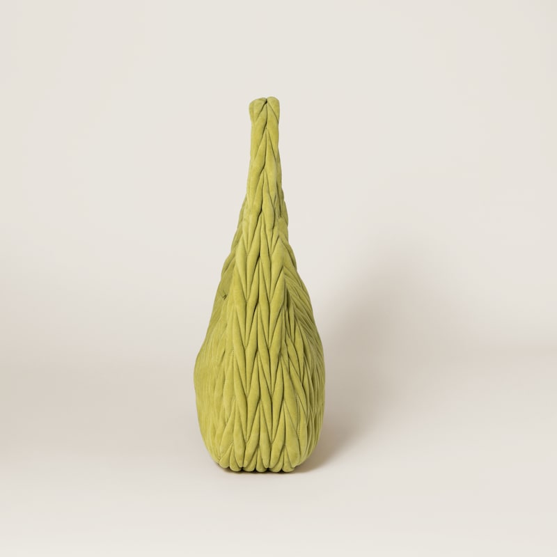 Wander matelassé suede bag