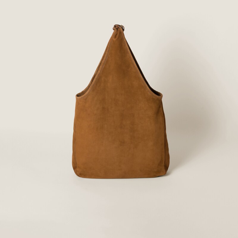 Suede handbag with tassels