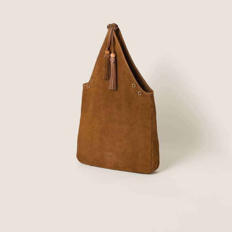 Suede handbag with tassels