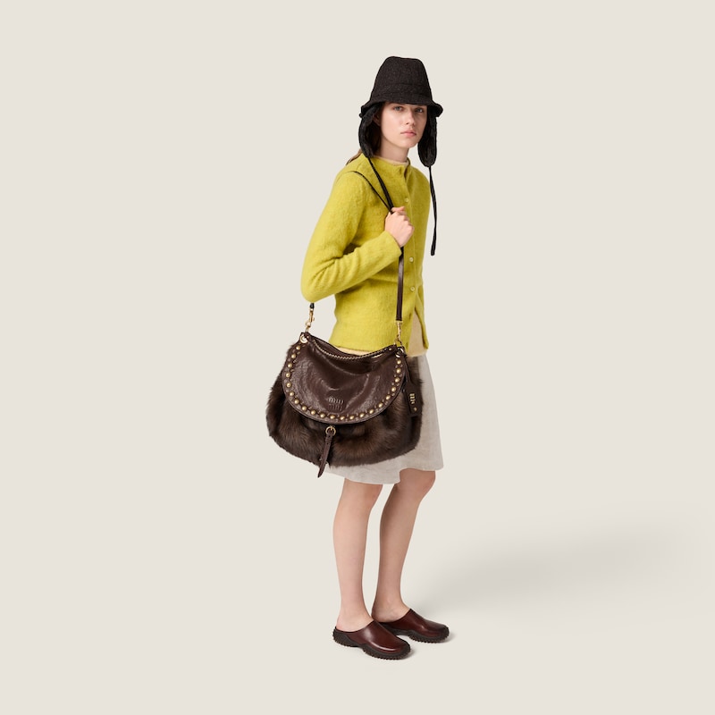 Rendez-vous shearling and nappa leather bag with studs