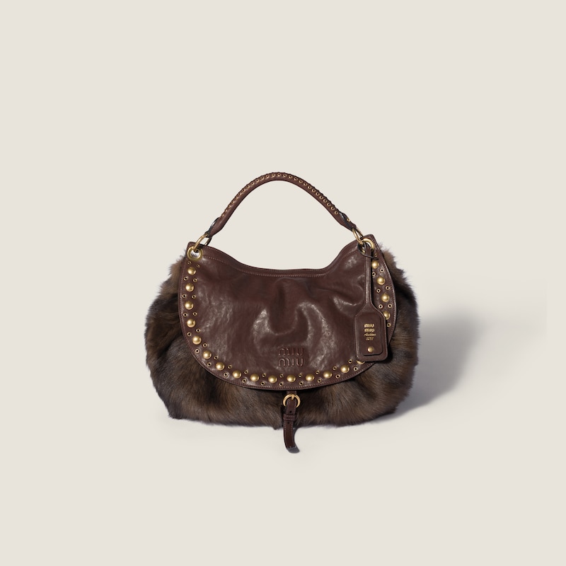 Rendez-vous shearling and nappa leather bag with studs