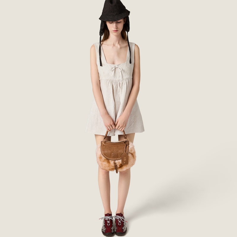 Sac Rendez-vous en shearling et cuir nappa orné de clous en métal