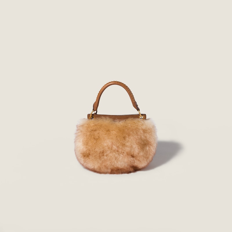 Sac Rendez-vous en shearling et cuir nappa orné de clous en métal