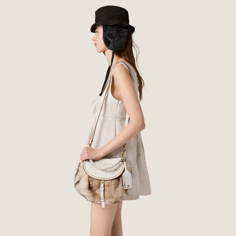 Sac Rendez-vous en shearling et cuir nappa orné de clous en métal