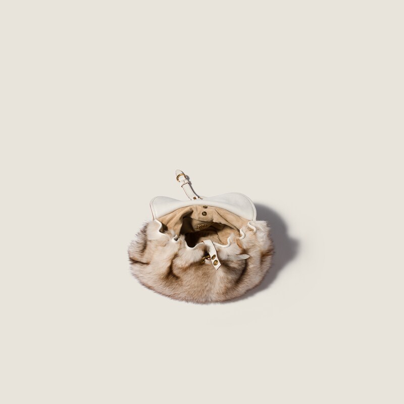Sac Rendez-vous en shearling et cuir nappa orné de clous en métal