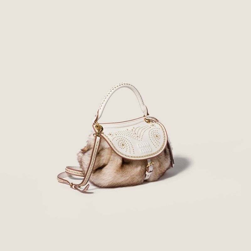 Sac Rendez-vous en shearling et cuir nappa orné de clous en métal