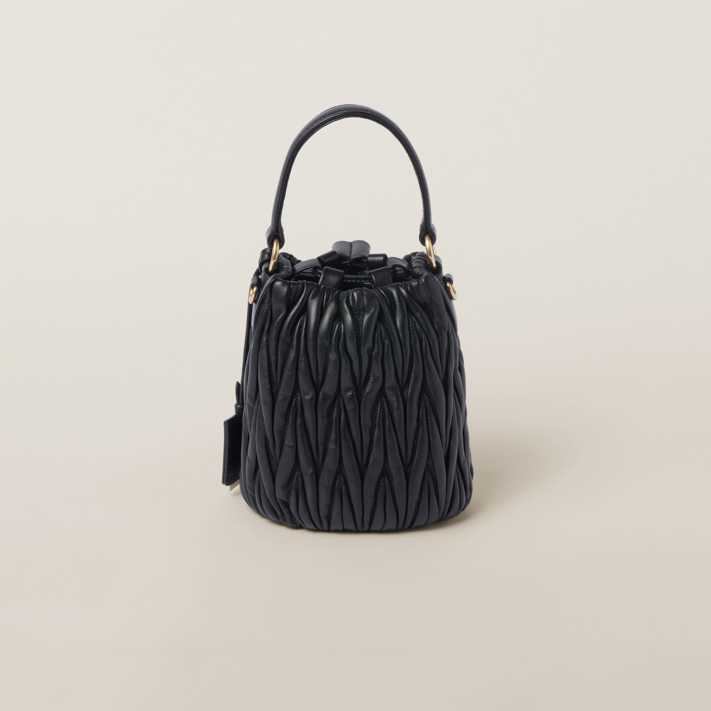 Shop Miumiu Matelassé Nappa Leather Bucket Bag In Black