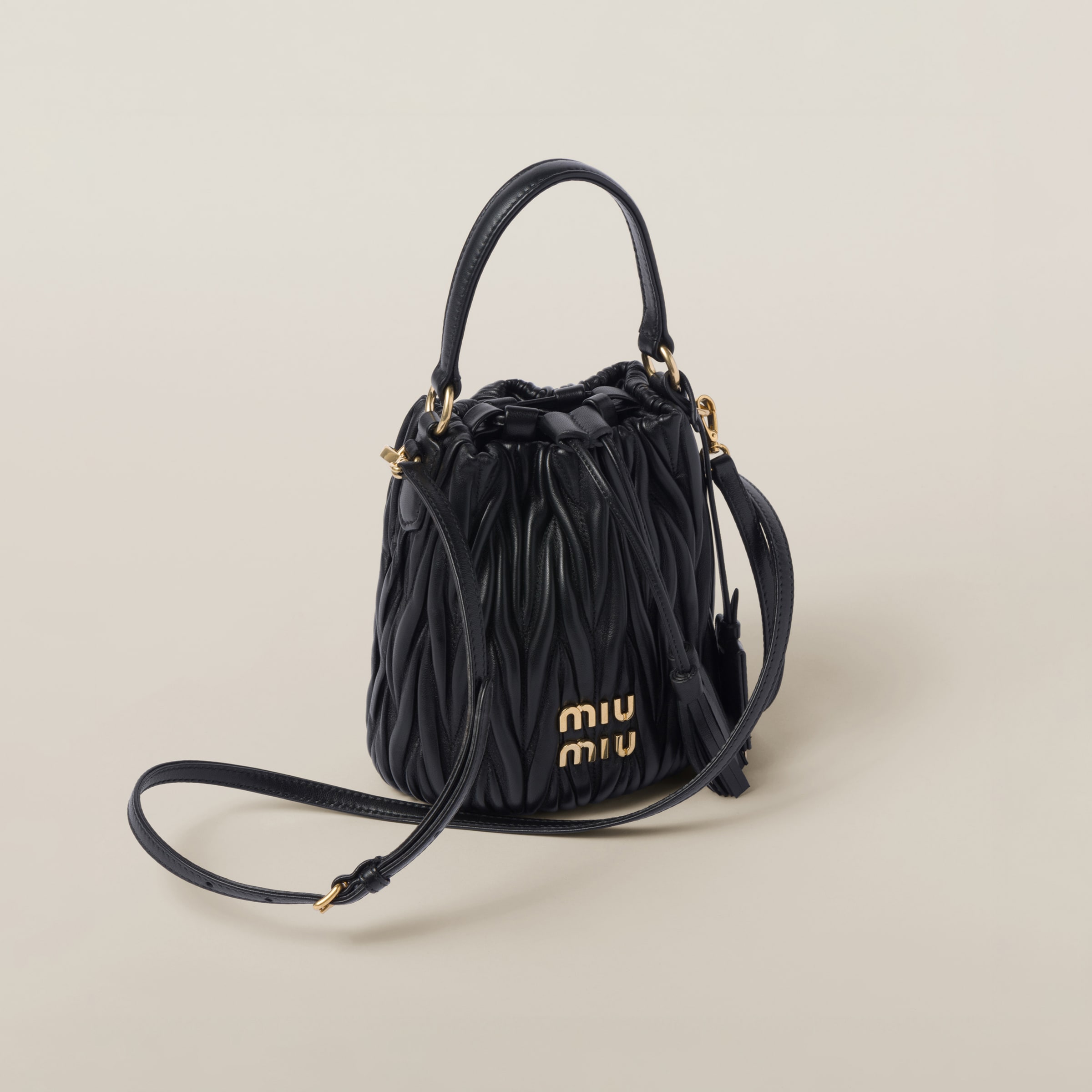 Shop Miumiu Matelassé Nappa Leather Bucket Bag In Black