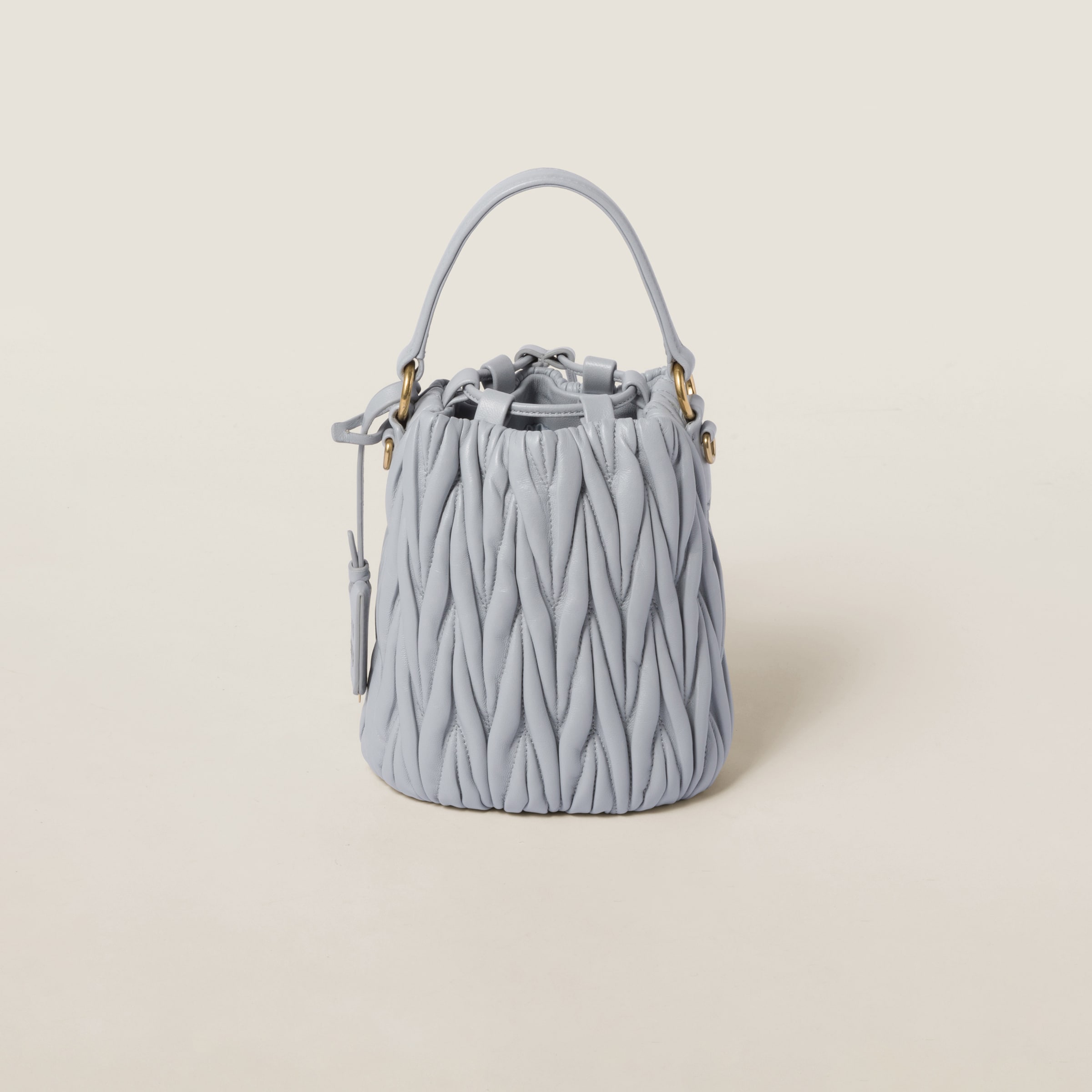 Shop Miumiu Matelassé Nappa Leather Bucket Bag In Cornflower