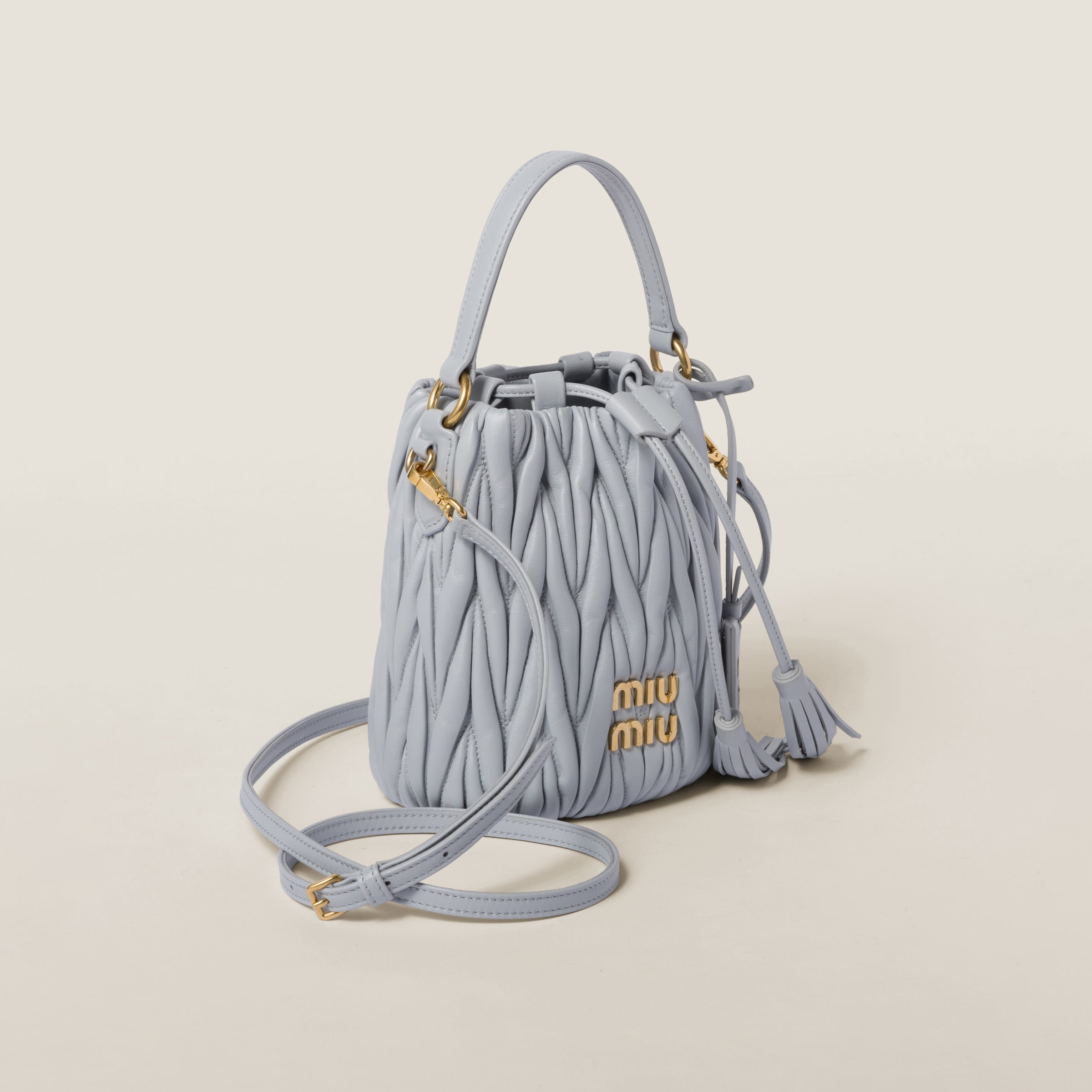 Shop Miumiu Matelassé Nappa Leather Bucket Bag In Cornflower