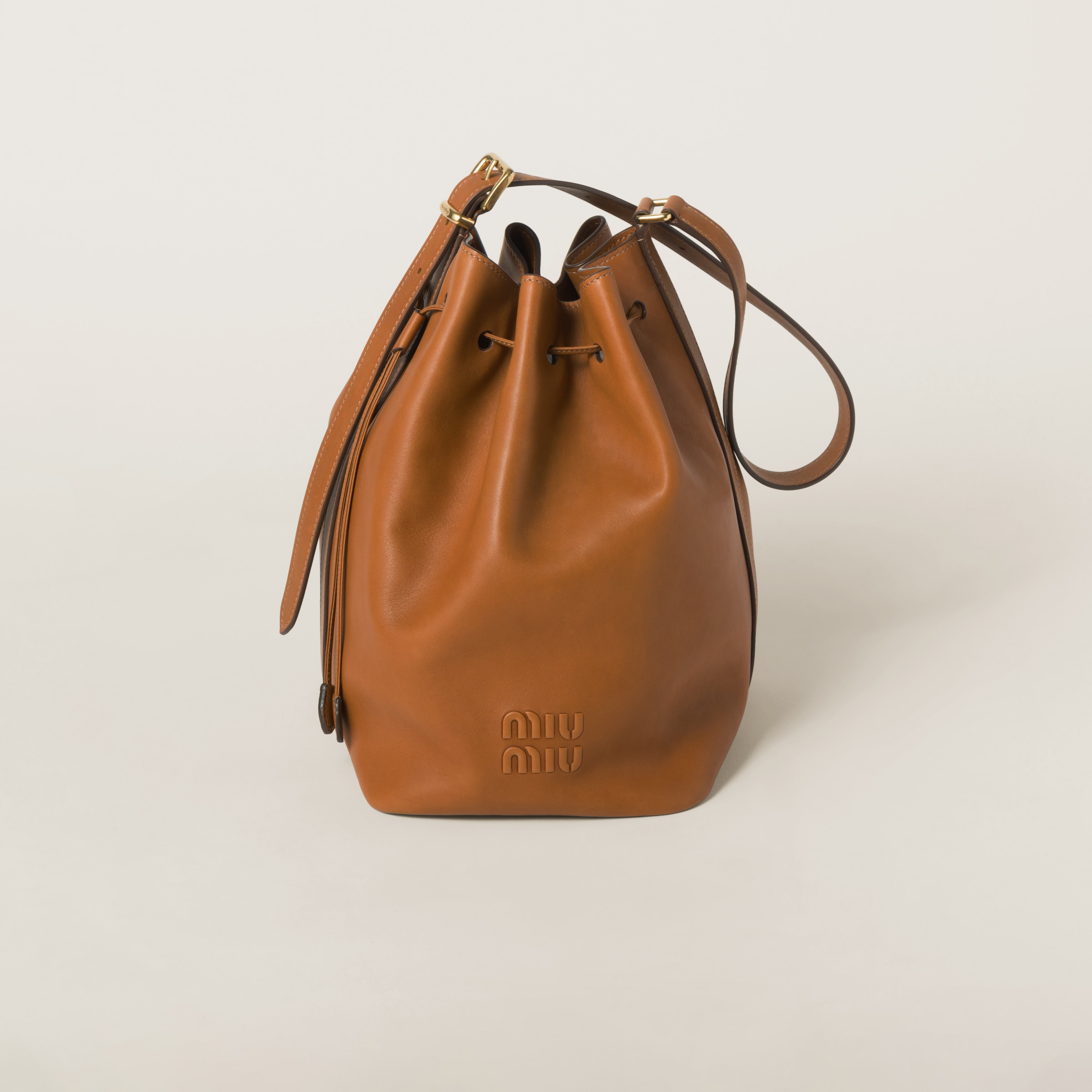 Miumiu Leather Bucket Bag In Cognac