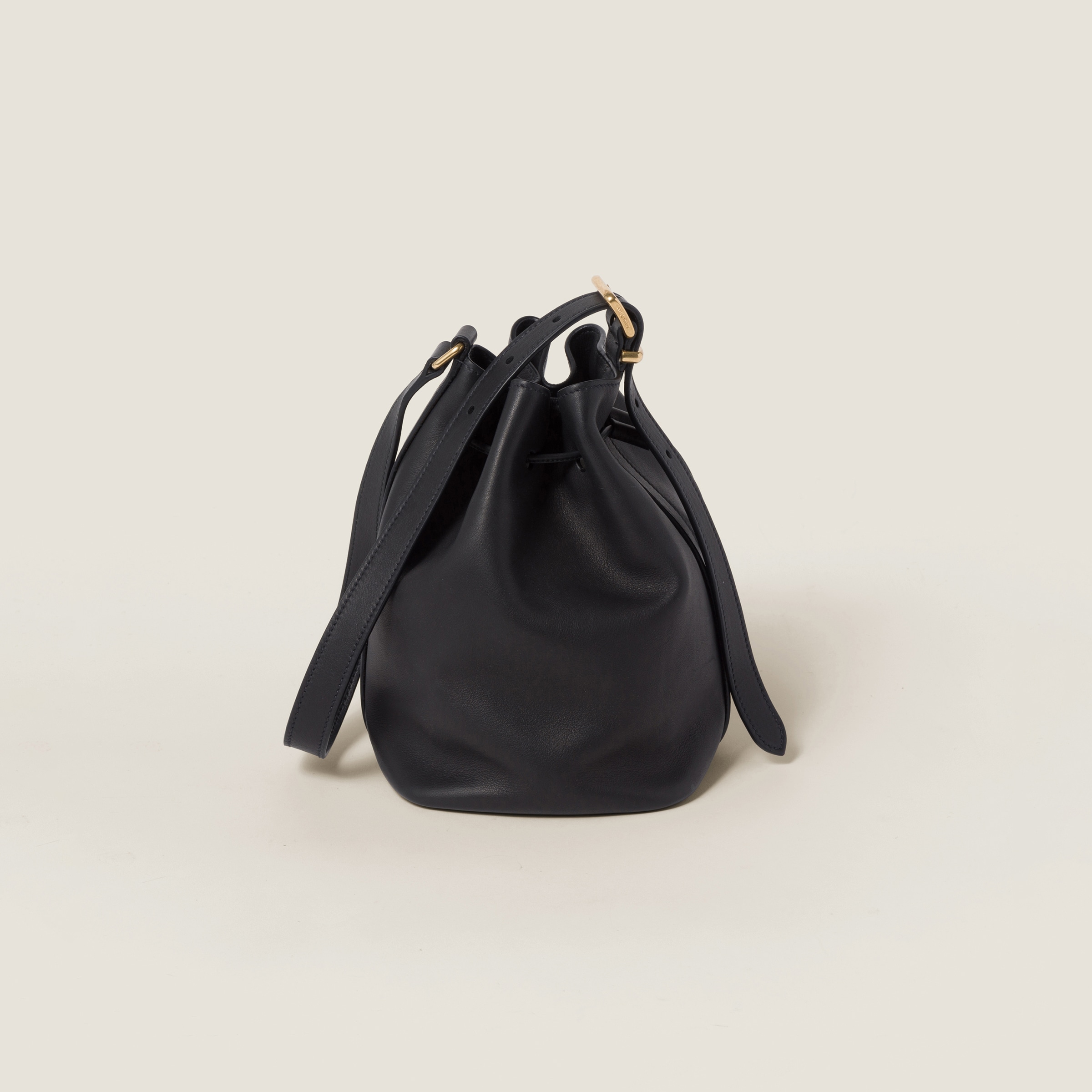 Shop Miumiu Leather Bucket Bag In Black