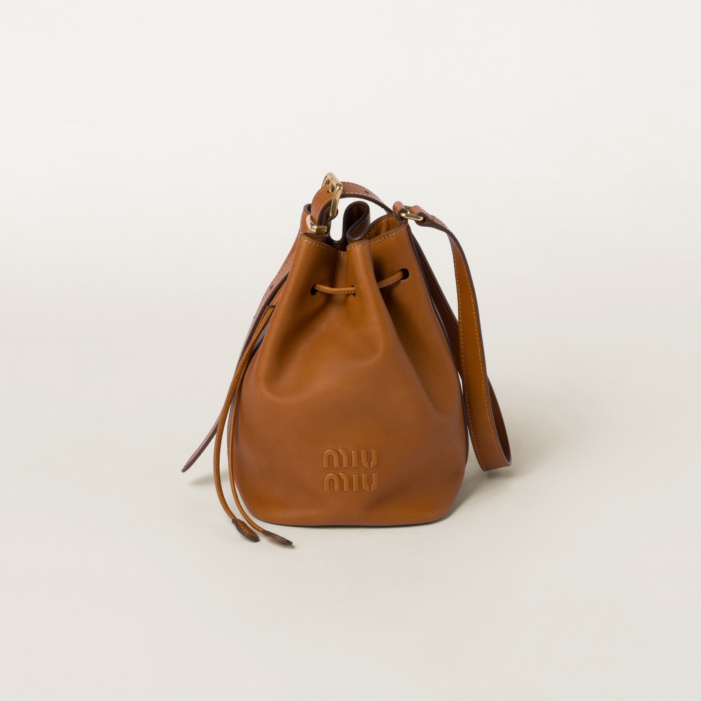 Miumiu Leather Bucket Bag In Cognac