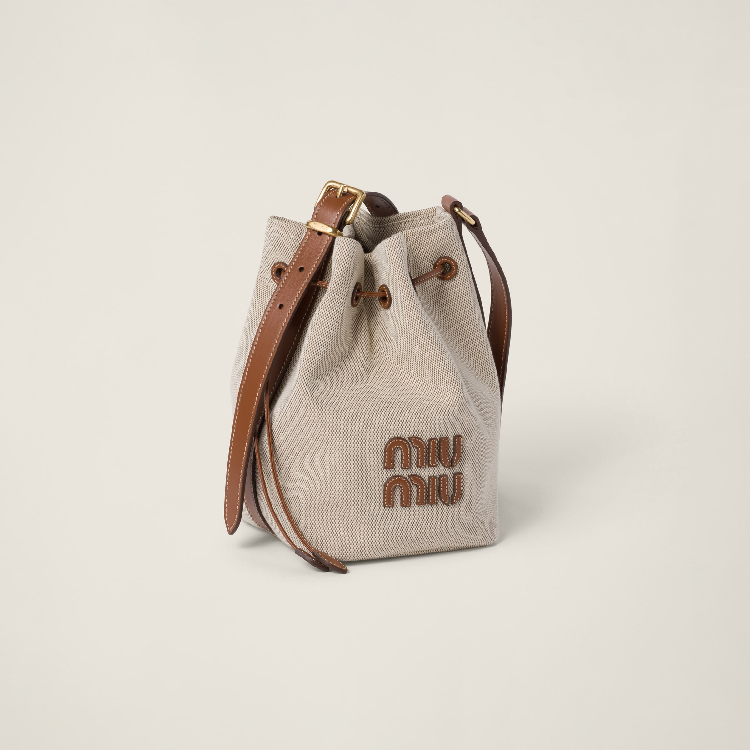 Shop Miumiu Canvas And Leather Bucket Bag In Beige/brandy