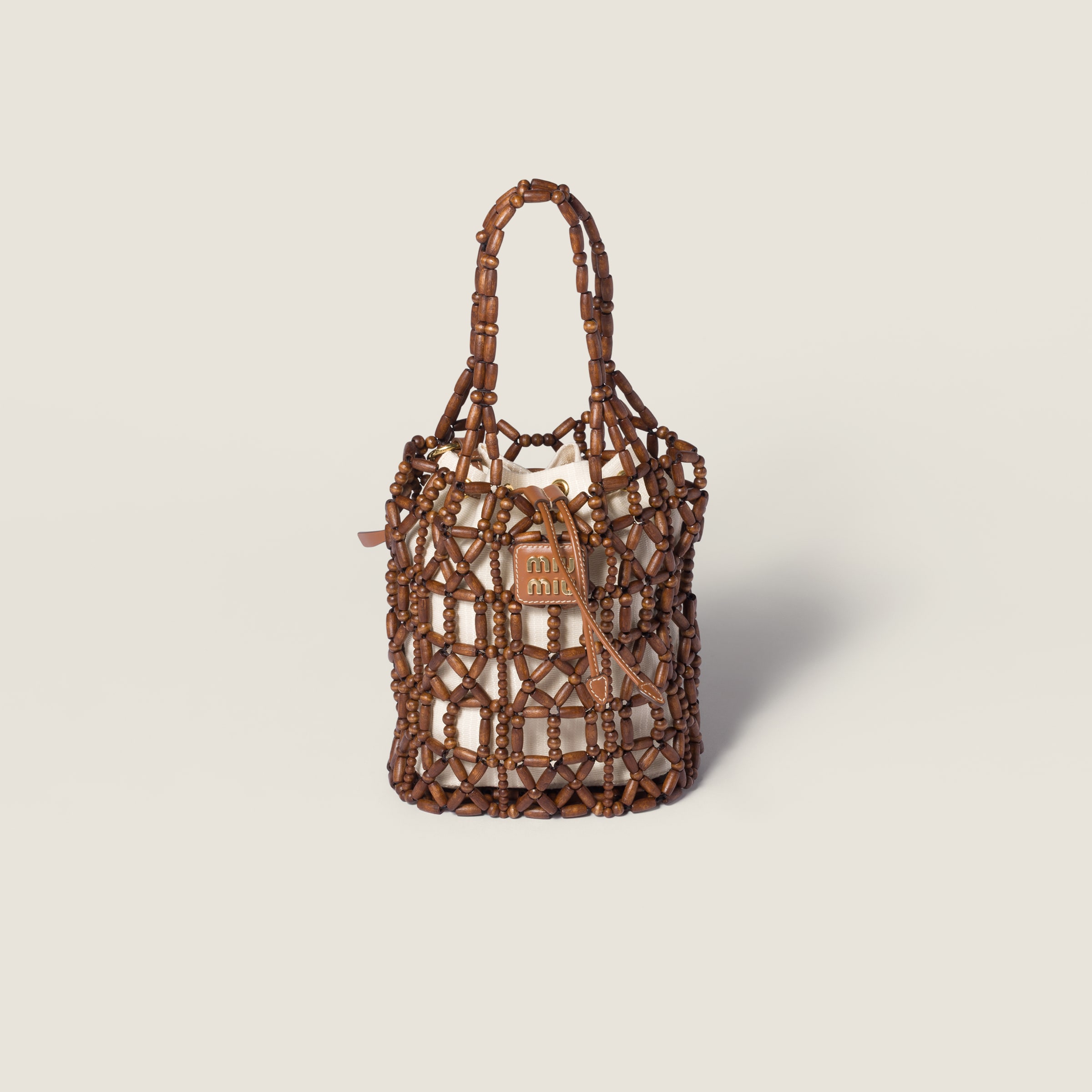 Mesh bucket bag from Miu Miu - $2,200