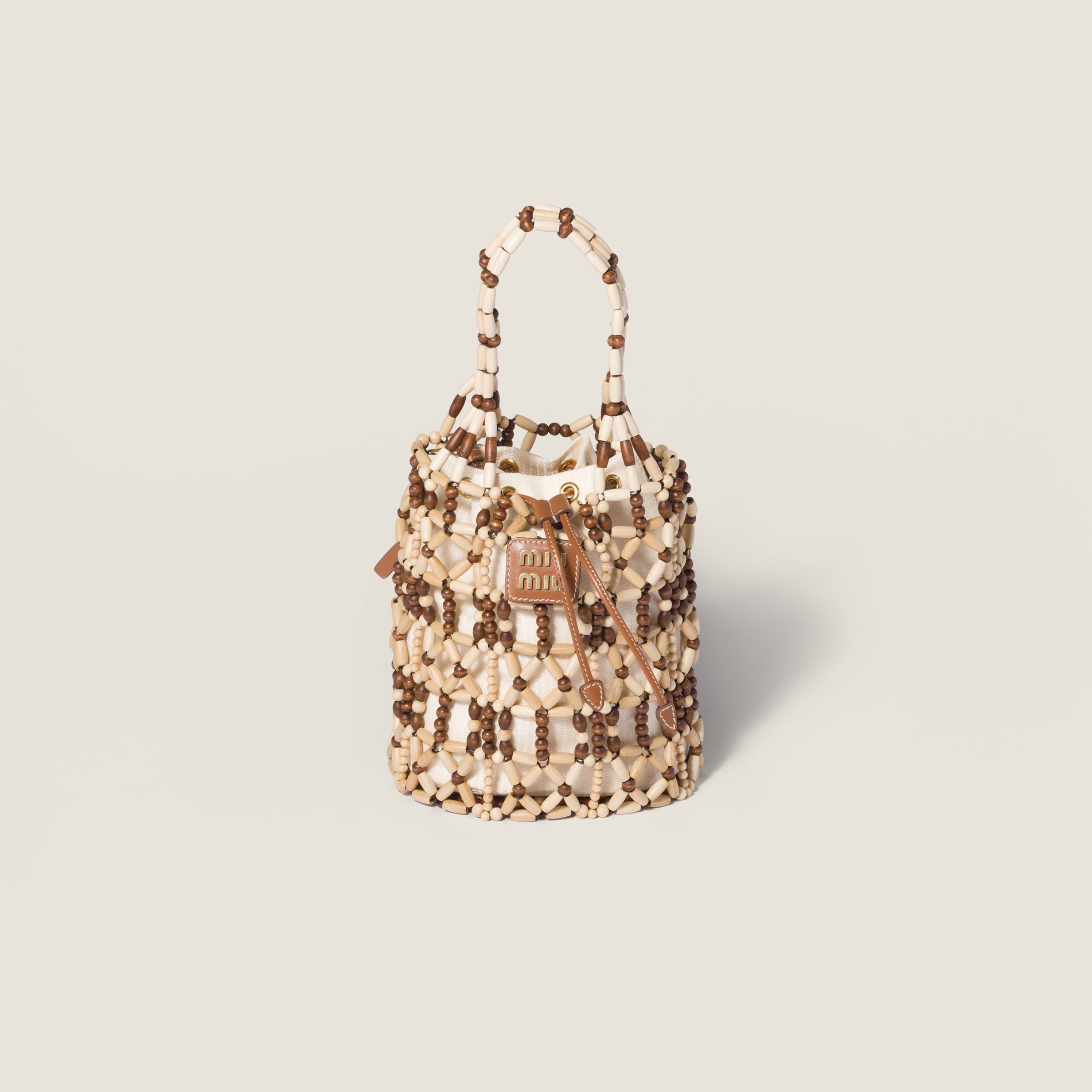 Mesh bucket bag from Miu Miu - $2,200